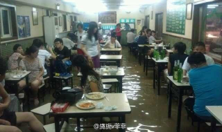 Illustration for article titled Beijing Flooding is Surreal and Awful